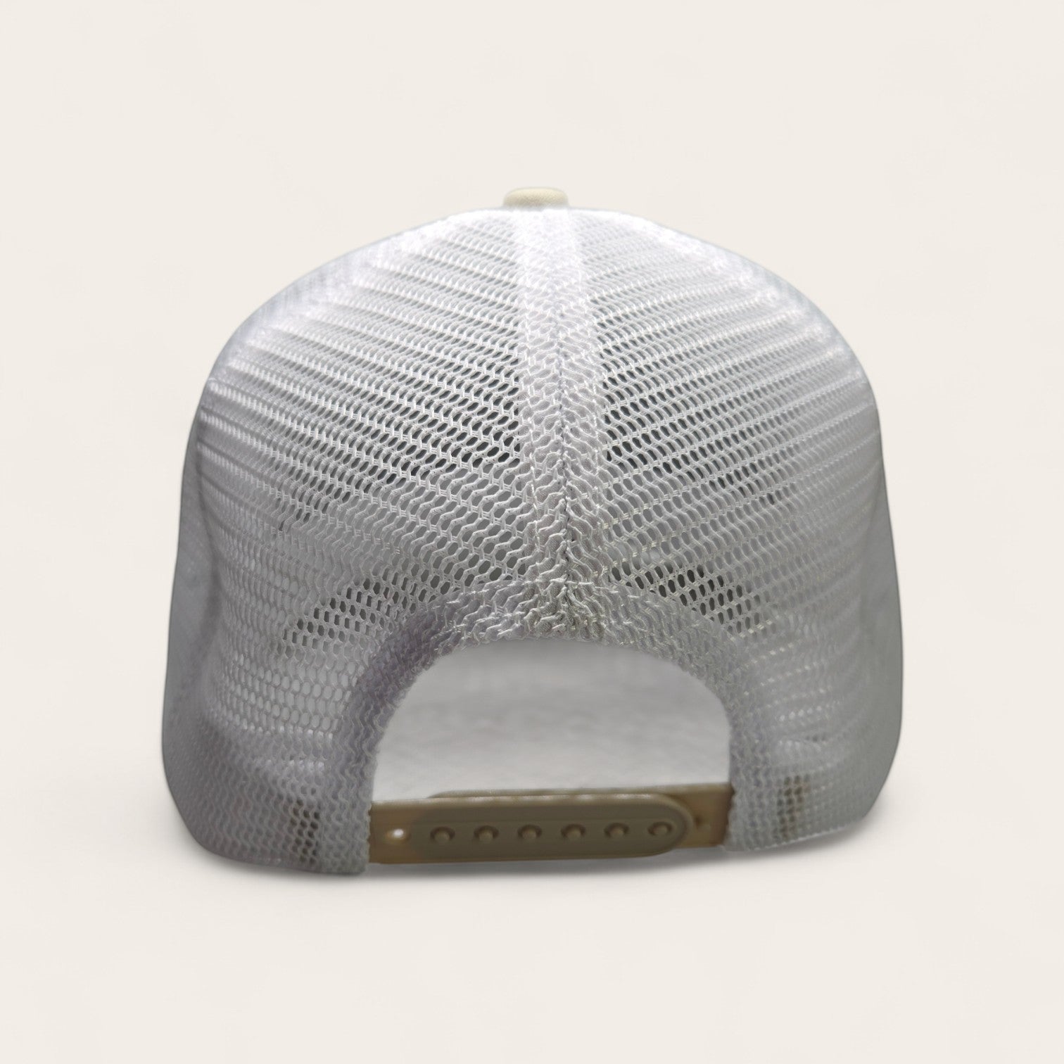 Haze N Handle stone and white trucker hat with mesh back and adjustable snapback