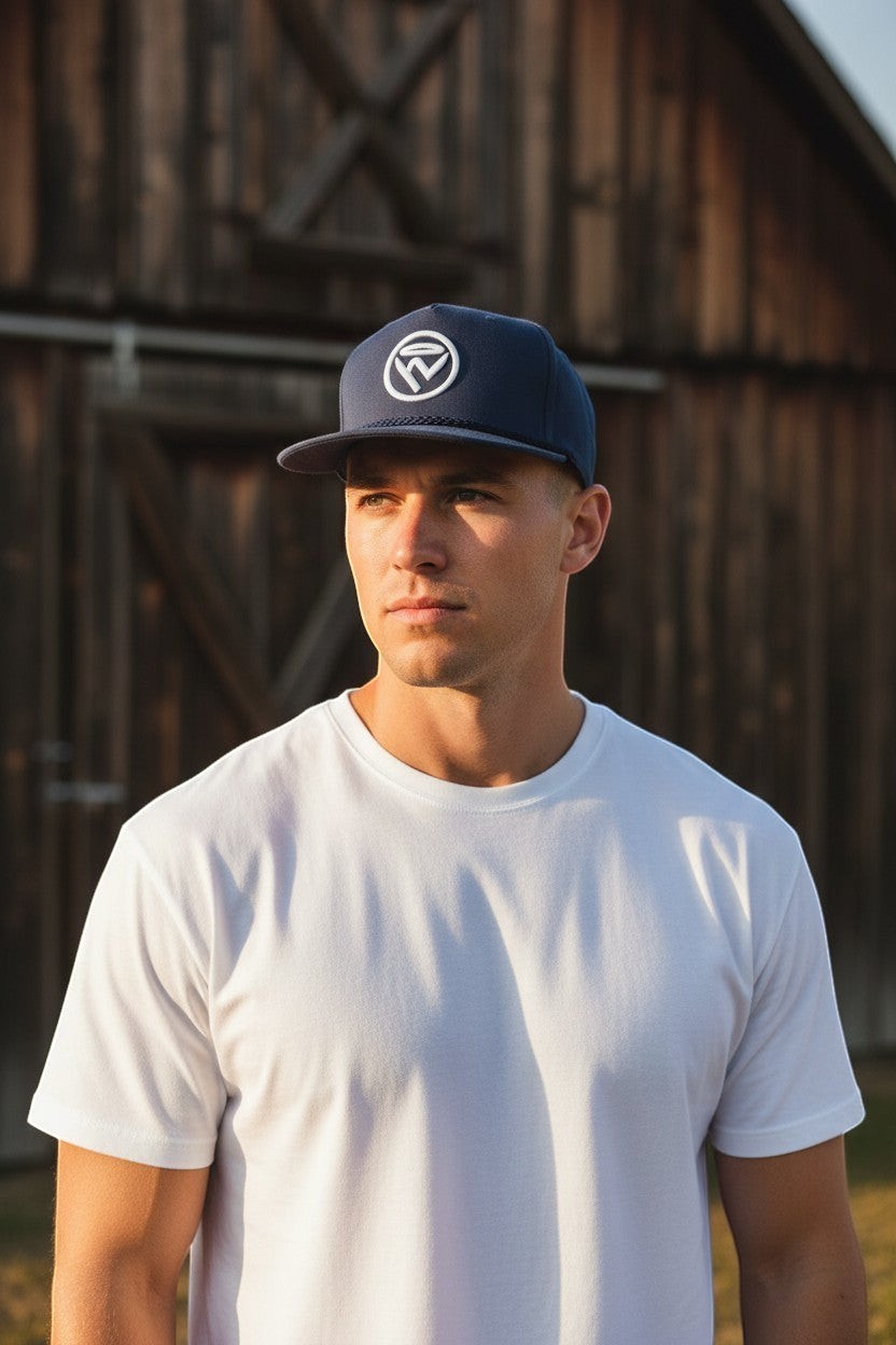 Haze N Handle navy blue flat brim rope hat with embroidered logo on front, worn by a man in a white t-shirt.